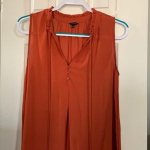 Rust colored sleeveless top